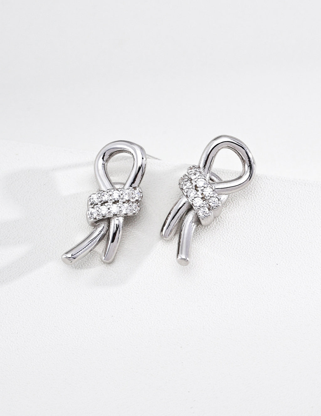 Knot Zircon Studs in White Gold – front view
