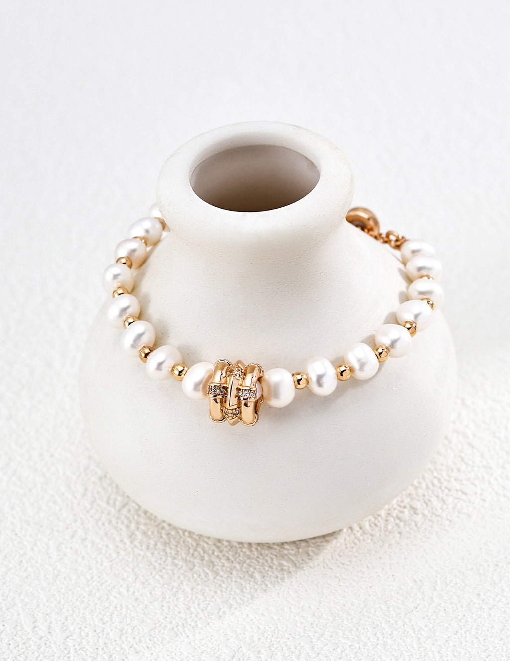 Star Wheel Pearl Bracelet in Vintage Gold – front view
