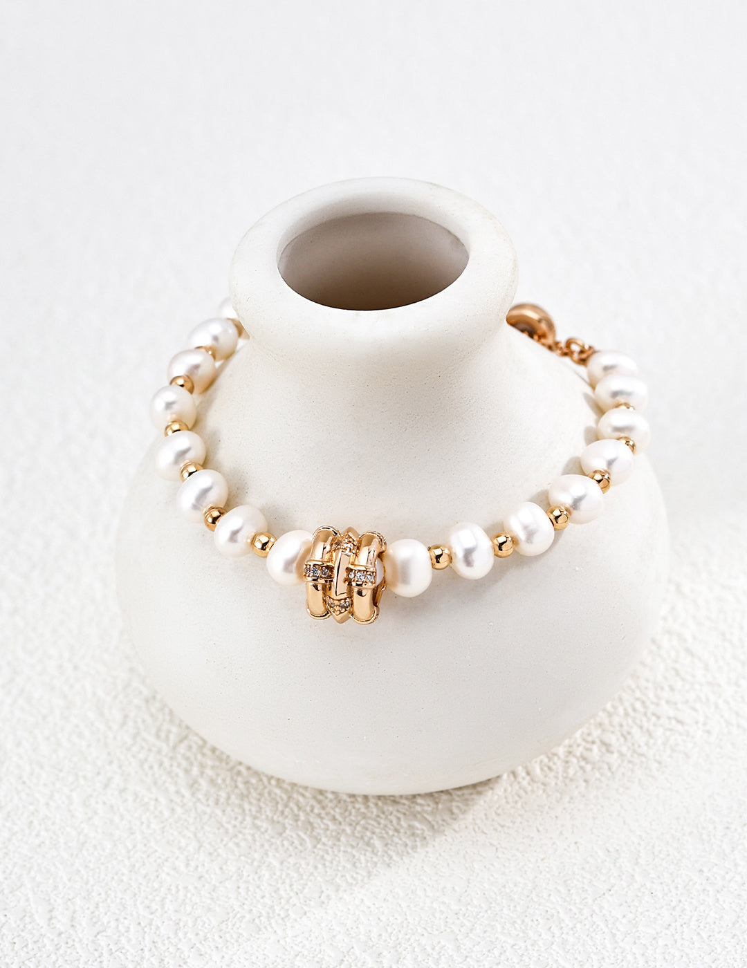 Star Wheel Pearl Bracelet in Vintage Gold – front view